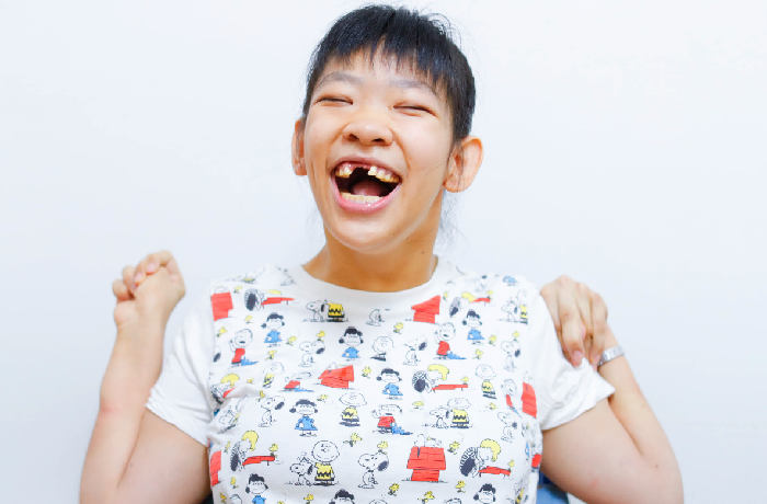 腦麻者渝延用眼睛，回應媽媽的愛